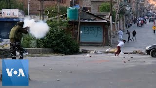 Police Clash With Protesters Amid Kashmir Lockdown [upl. by Arateehc]