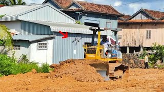 Trone activity falls in front of a dozer pushing soil [upl. by Mohkos]