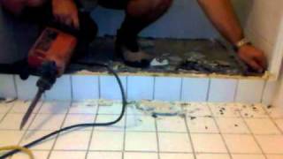 DiaOseal Australia  Quick and easy drummy shower floor tile removal [upl. by Enirroc]