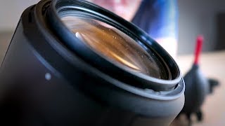 Cleaning DSLR lenses using lens wipes  How to clean it FAST without streaks [upl. by Uv896]