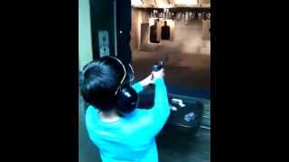 Louis Shooting a 22mm Ruger pistol at Bobs Gun Shop [upl. by Arlynne]