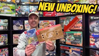 NEW Nintendo Switch Lite Hyrule Edition Unboxing [upl. by Eilsew]