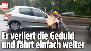 KlimaDemo eskaliert Fahrer schleift KlimaChaoten mit [upl. by Ingeborg]