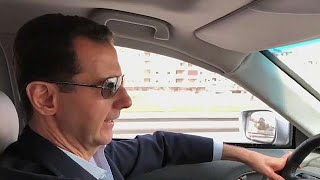 Assad filmed driving himself to the front lines of Syrian civil war [upl. by Stefania417]