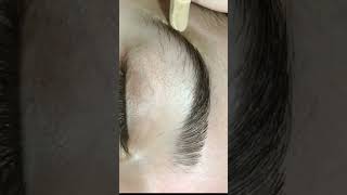 Threading eyebrows with wax waxing threading eyebrows [upl. by Llenahc]