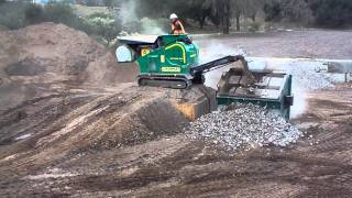 Lem Track 4825 mobile jaw crusher crushing concrete w vibrating screener part 1 [upl. by Ayrb]