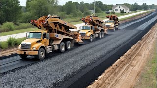 A road construction with a gravel spreading truck and dump trucks work together to lay down gravel [upl. by Diandra]