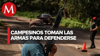 Autodefensas de Puebla luchan contra Familia Michoacana en la mixteca [upl. by Derdle708]