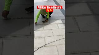 Fill floor tile adhesive tiles tilework finishingwork construction civilengineering grouting [upl. by Cordova]