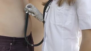 Doctor Using Stethoscope Stock Video [upl. by Ybeloc491]