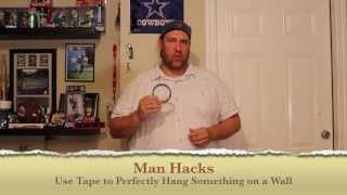 Man Hacks  Use Tape to Perfectly Hang Something on a Wall [upl. by Aracat]