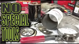 Easy way to remove a stuck oil filter  How to remove a stuck oil filter [upl. by Lyrahs]