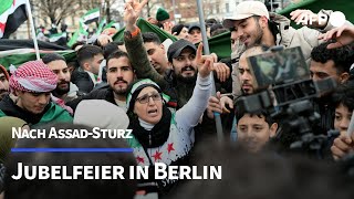 Tausende Syrer feiern Sturz von Assad in Berlin  AFP [upl. by Ojimmas616]