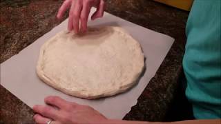 Shaping Pizza Dough on Parchment Paper [upl. by Magas]